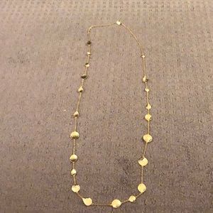 Long gold necklace
